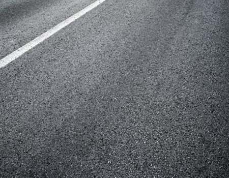 Detail of asphalt road with white line Detail of asphalt road with white line